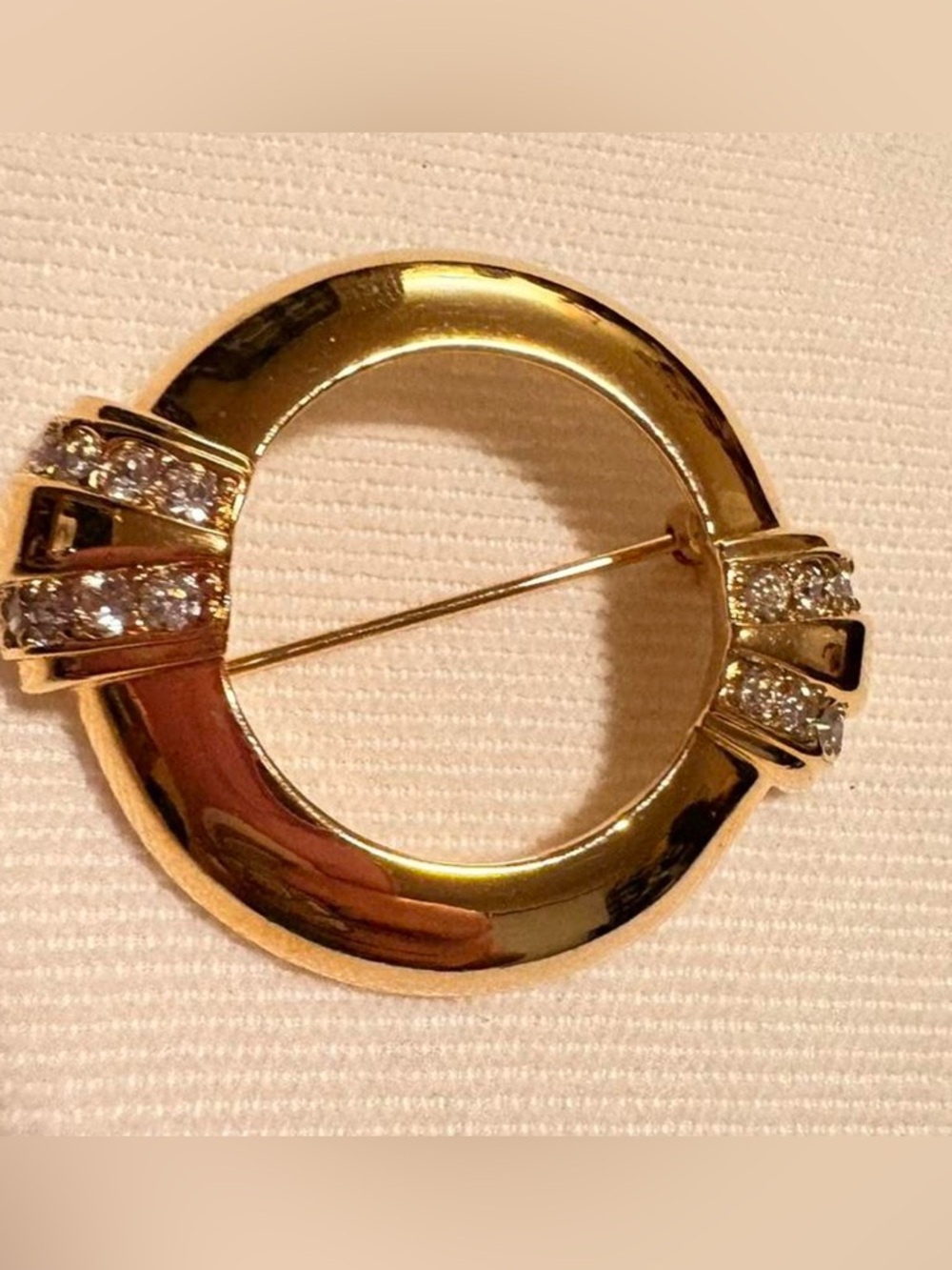 Avon Gold-Tone Circular Brooch with Clear rhinestones
